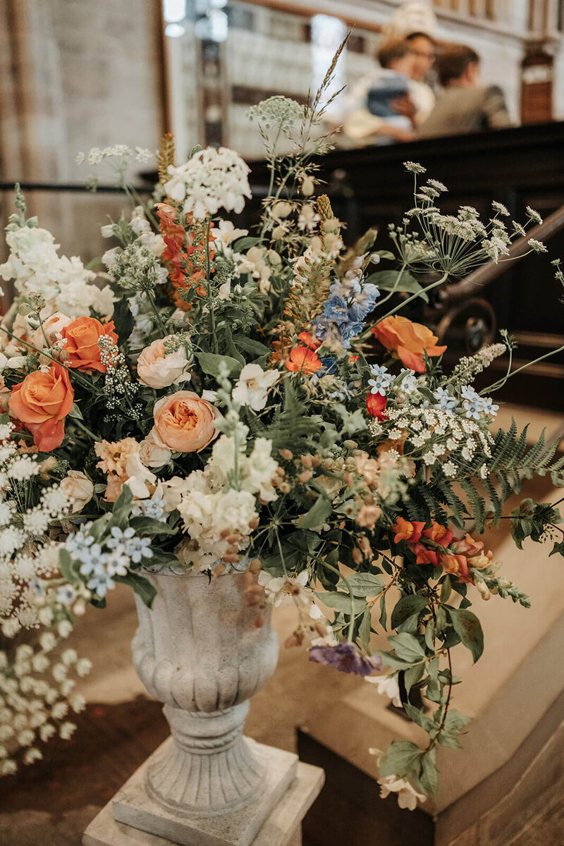 An urn of flowers at Herefordshire Cathedral