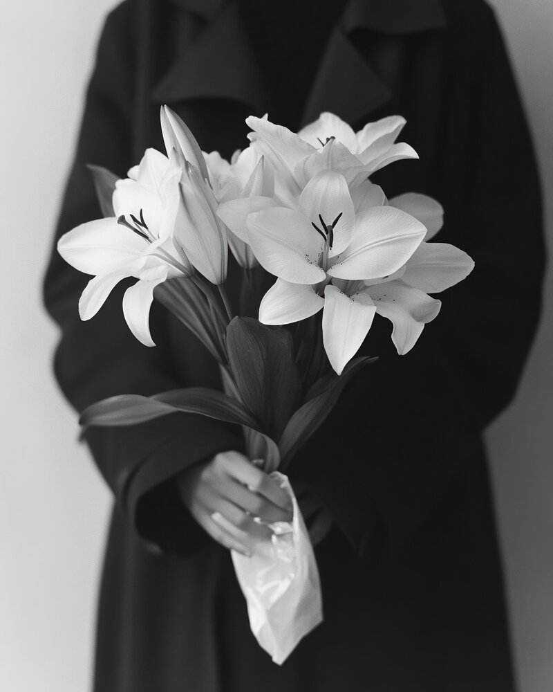 A sleek phone mockup displaying a modern 'Boost Your Skills' design, styled with a glass cup and a neutral, professional tabletop setting