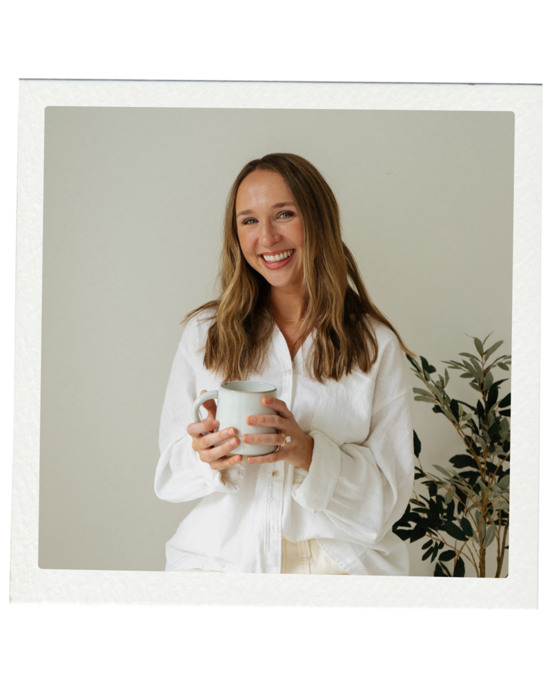 Licensed Christian therapist Halle Cherry smiling with a coffee mug in her Brentwood, TN office, founder of For the Sheepish Counseling Ministries