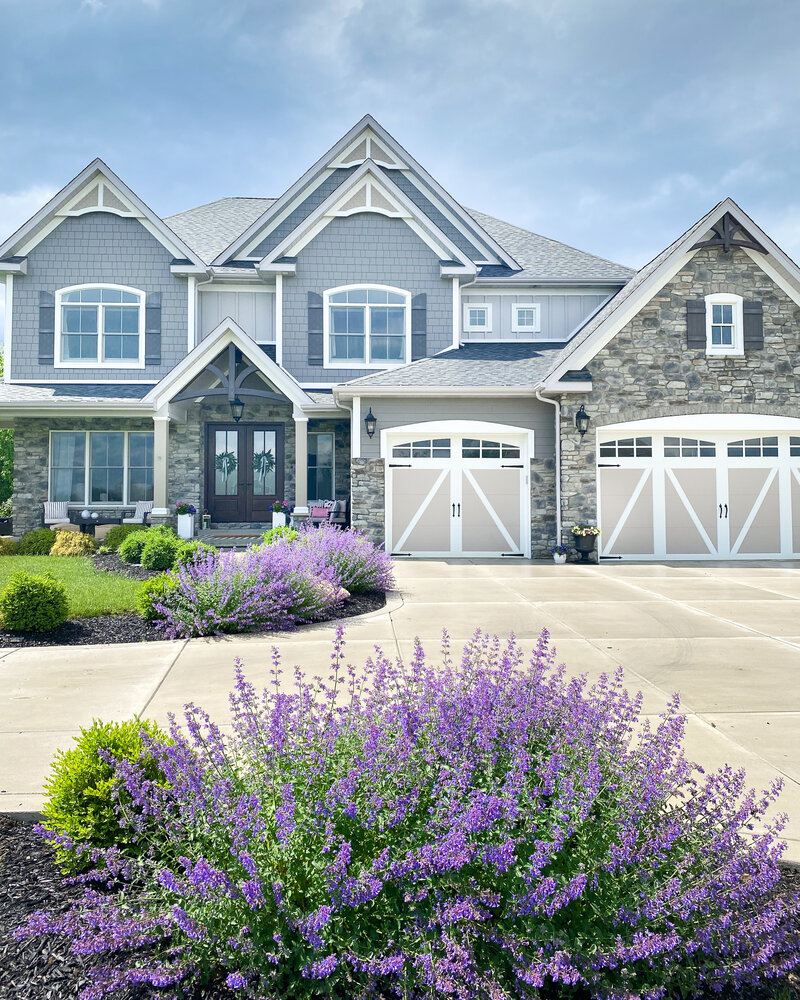 a home with a beautifully landscaped front yard