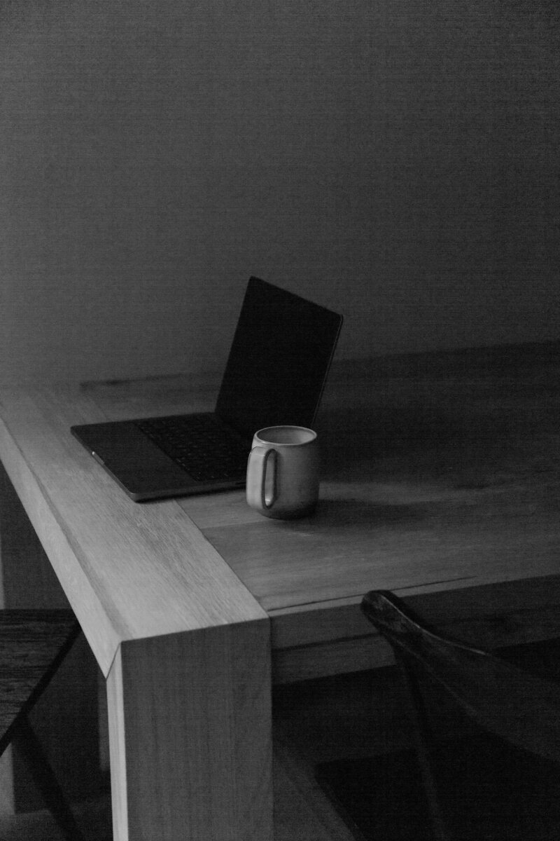 Sam sitting in her chair in her living room