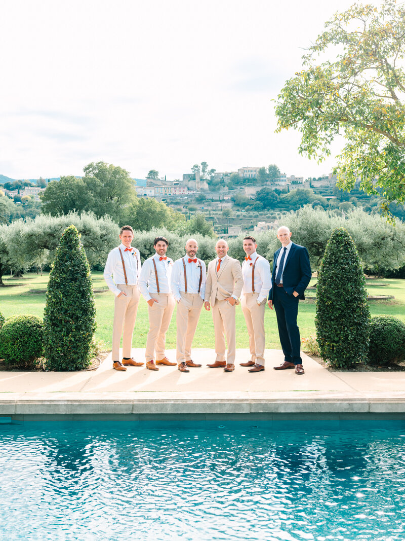 The Groom, Best Man, and Groomsmen by the Swimming Pool Overlooking the Provencal Village of Menerbes
