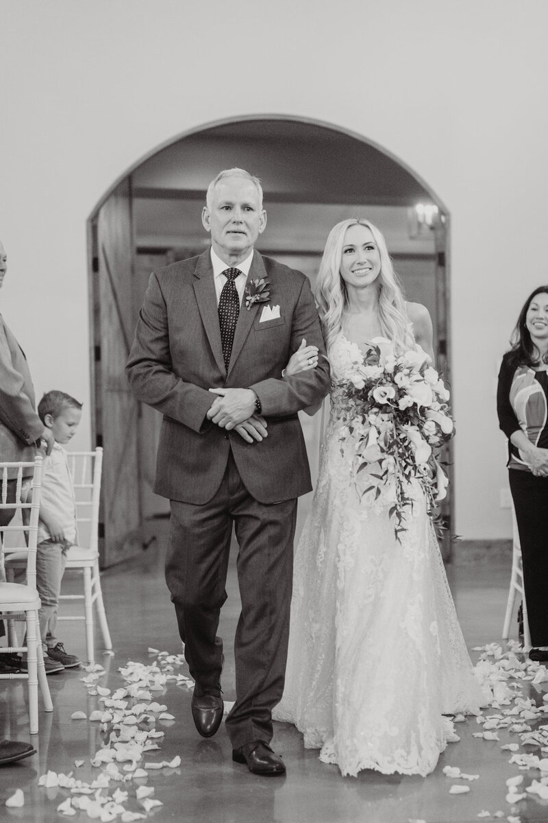 Indoor chapel ceremony at Canyonwood Ridge with modern architecture and soft light