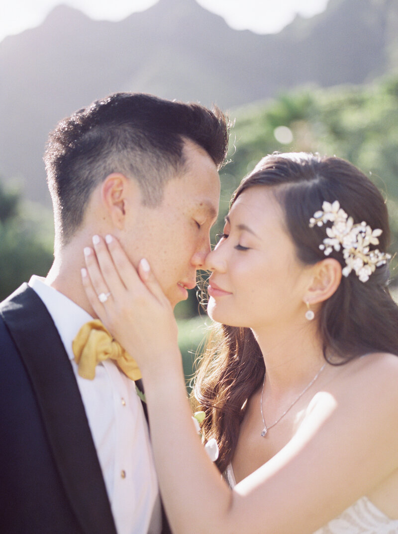 man and woman in embrace in hawaii