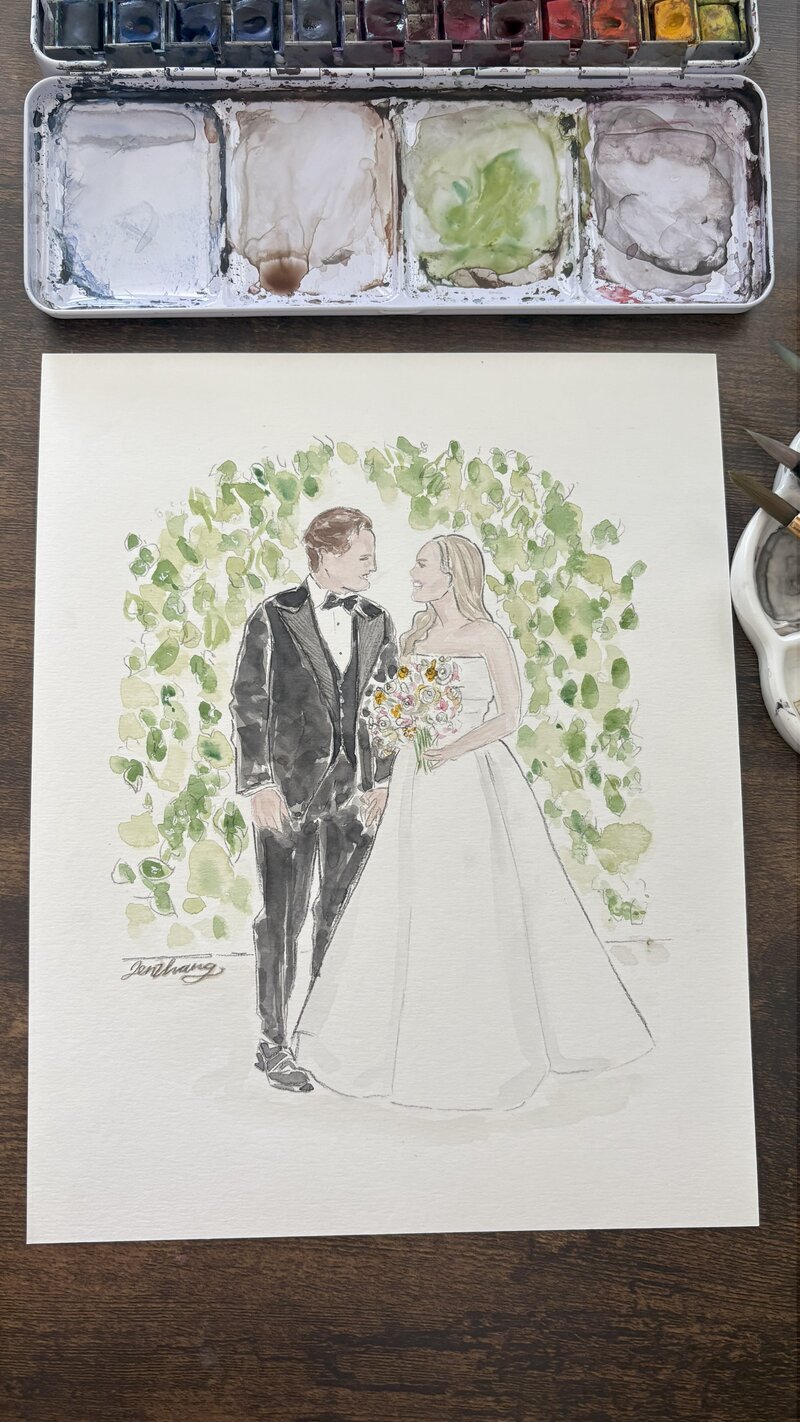 Custom wedding illustration of bride and groom standing together under greenery backdrop by Toronto live event artist Jenny Zhang.