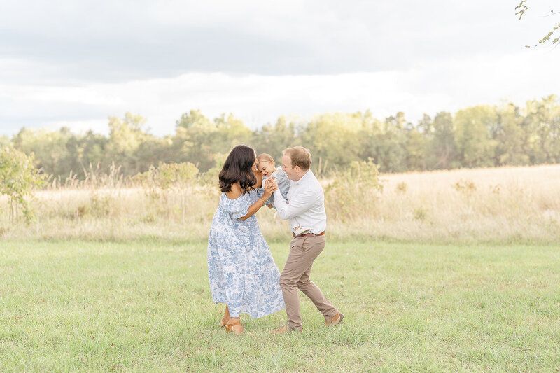 parents playing with their baby during Fairfax, VA family photography