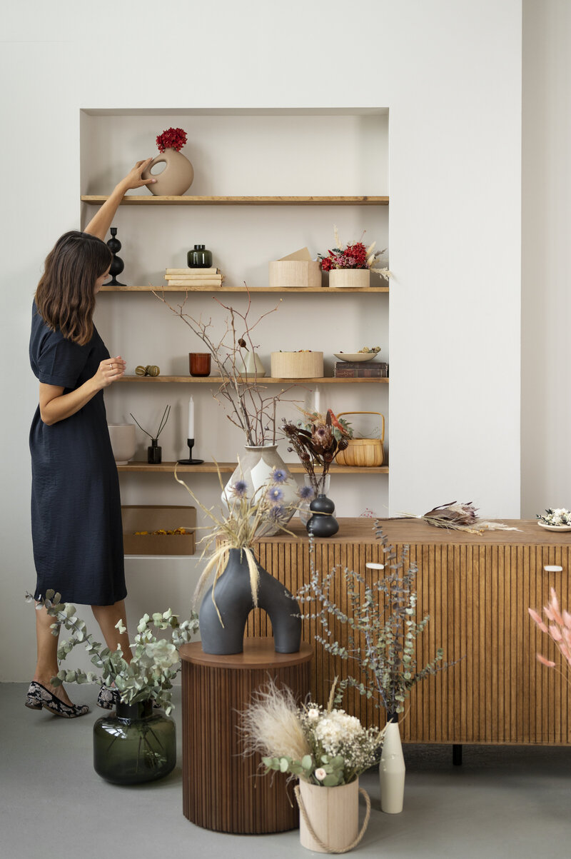 full-shot-woman-working-with-flowers