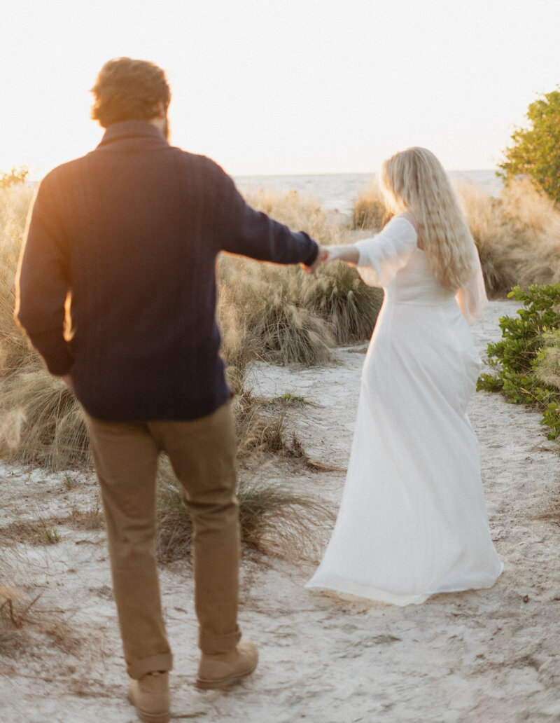 photo of engaged couple walking