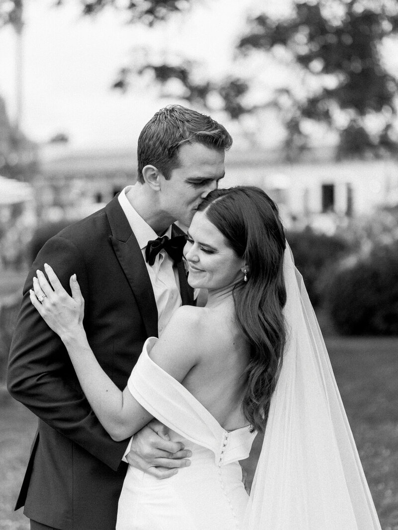 black and white classic wedding portrait of bride and groom