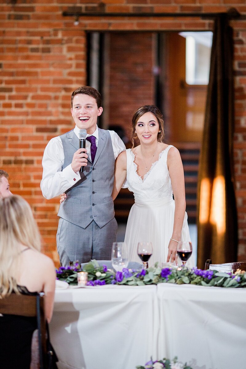 talking into microphone by Knoxville Wedding Photographer, Amanda May Photos