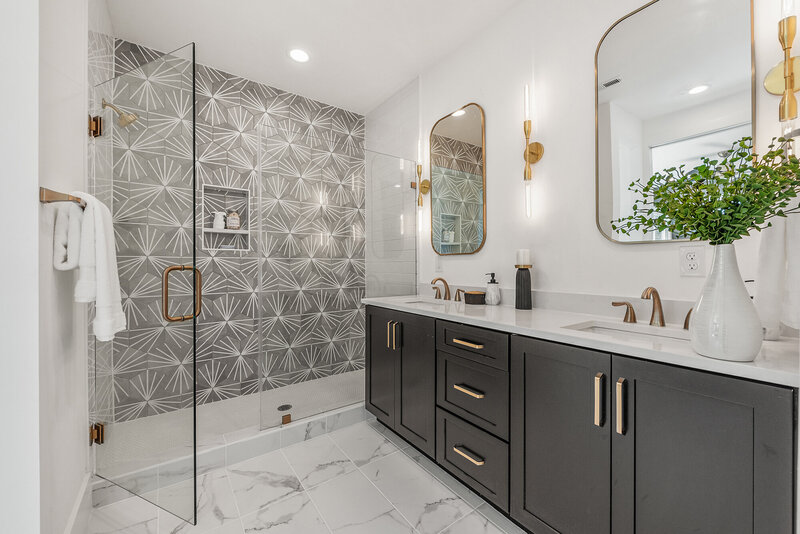 master bathroom with hexagon gray tile and walk in shower