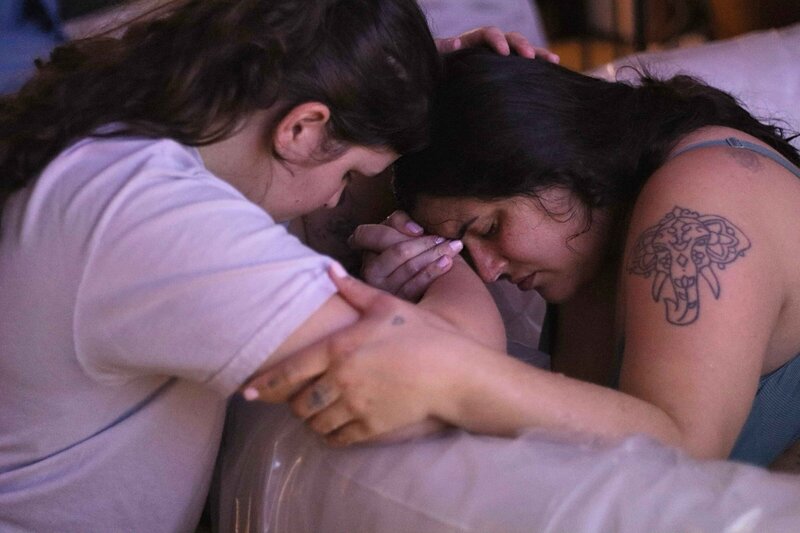 Doula Supporting Mother Through Natural Birth