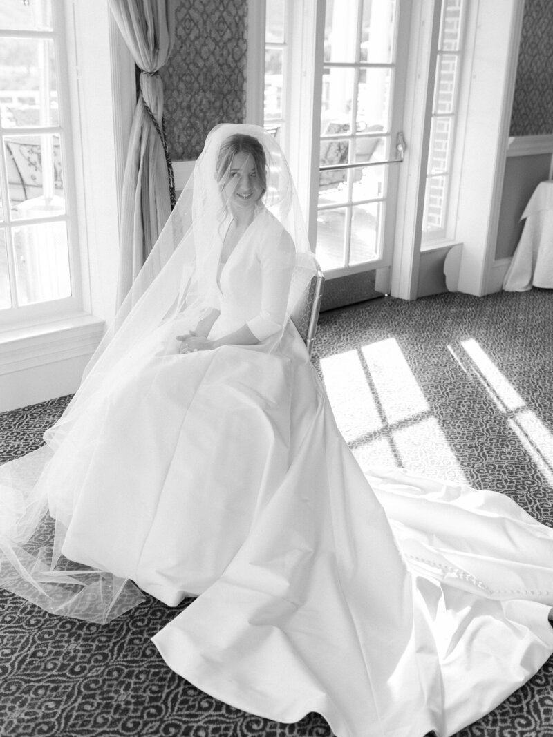  A California bride wearing a princess gown during her elegant ballroom wedding.