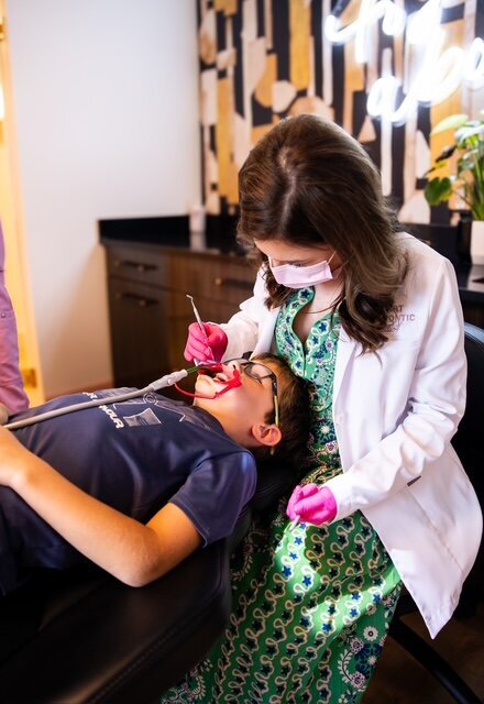 Dr. Savanah Stewart working on a pediatric patient at Stewart Orthodontic Studio in Jonesboro AR