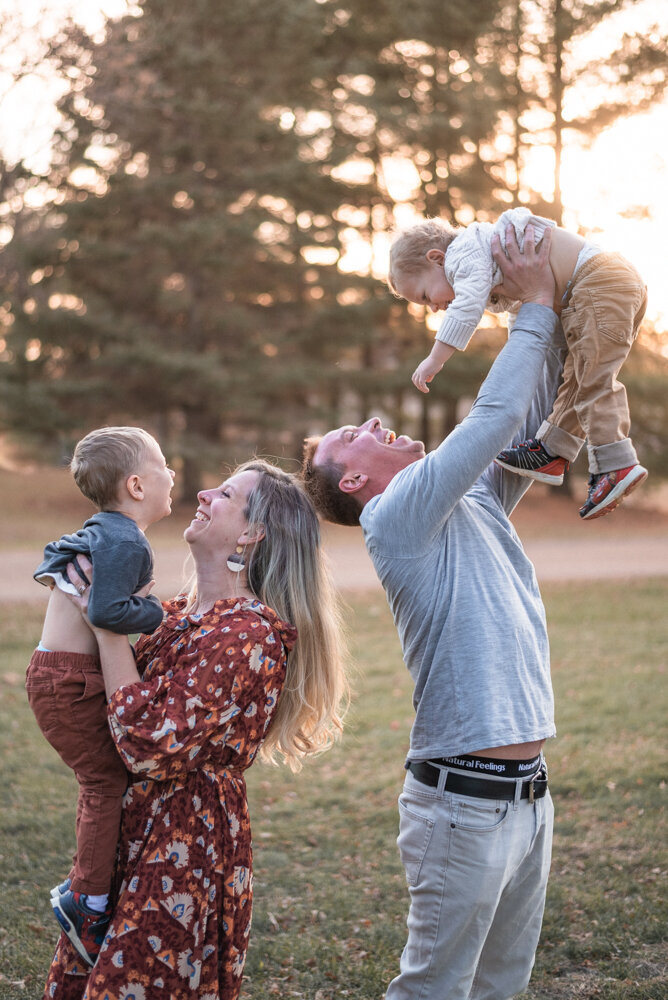 St Louis Brand Photographer Beck Hassel enjoying free time with family of four at golden hour.