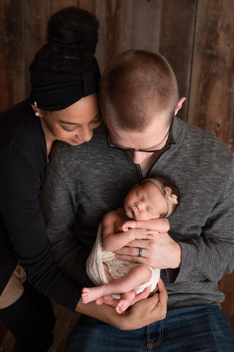 Appleton Wisconsin Newborn Photo baby in parents hands | Glory Be Photography by Tara Bos