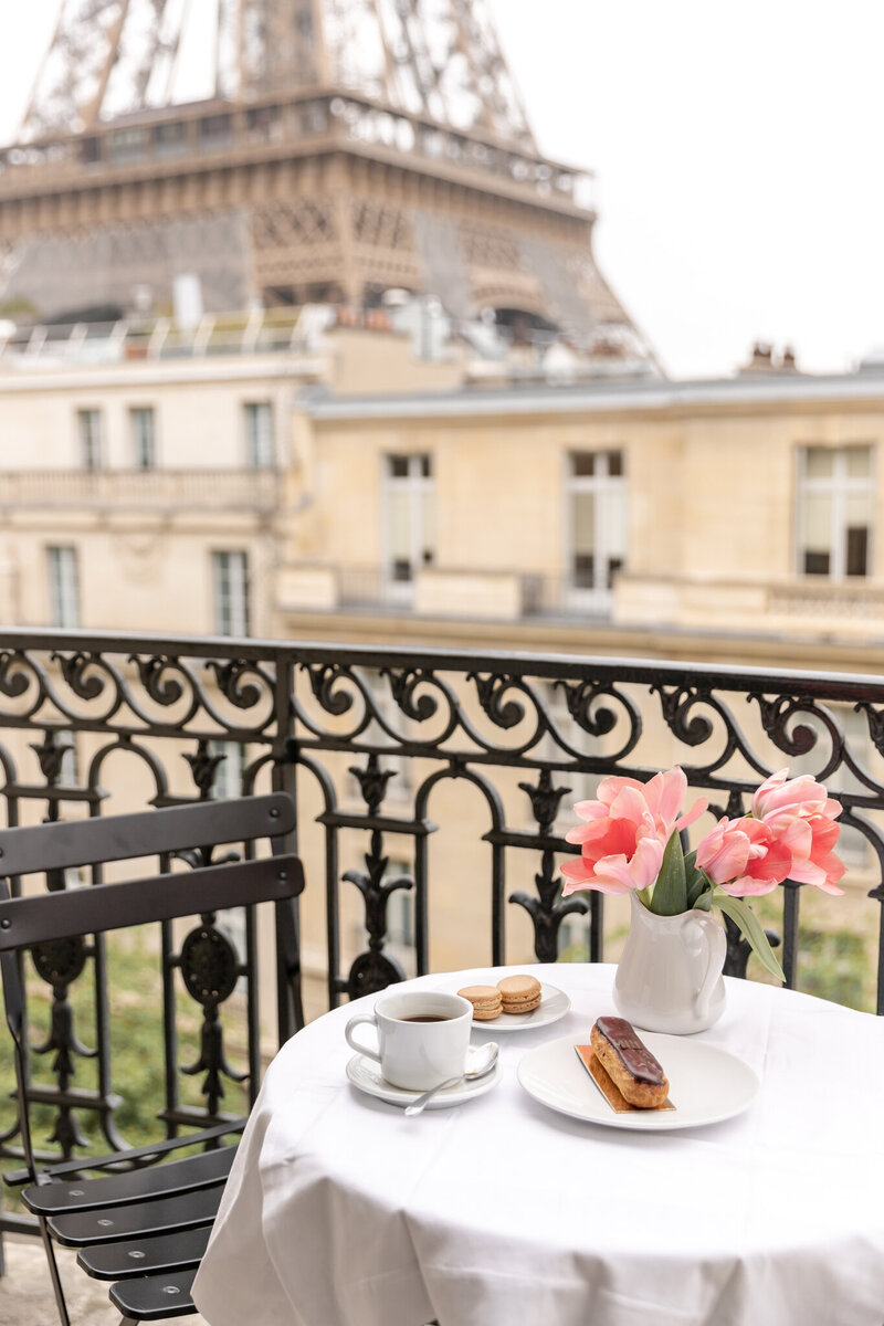 breakfast pastries on a table at a balcony in Paris