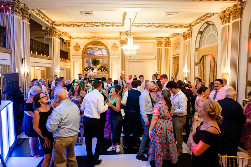 guests having fun during the wedding reception at george washington hotel