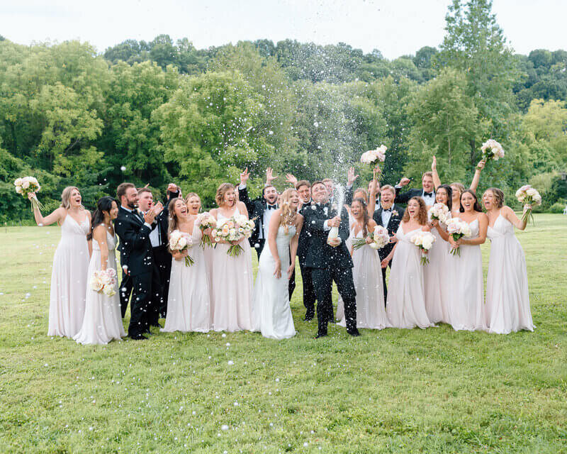 bridal party cheering by wedding photographers lexington ky