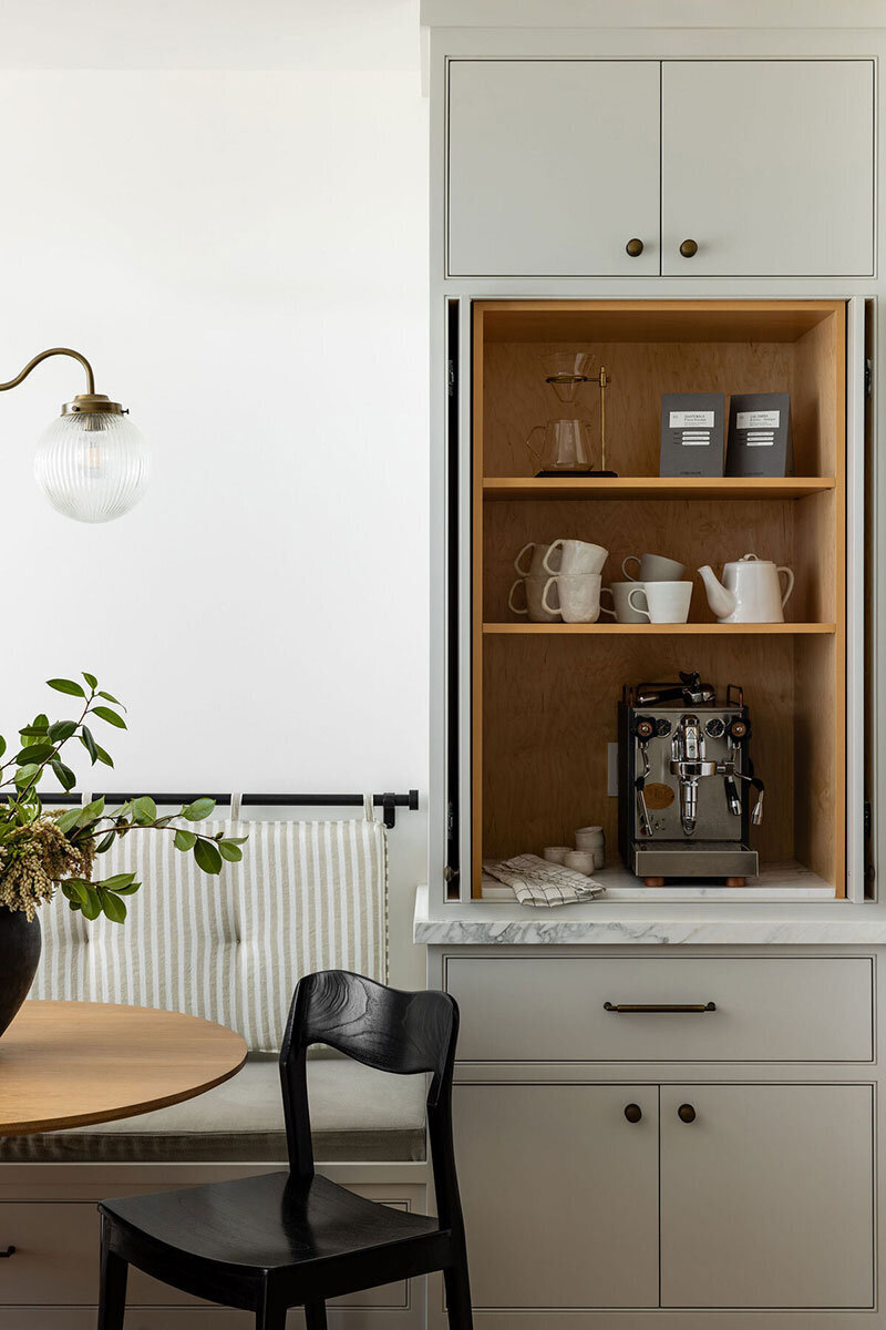 Open-concept space designed with thoughtful interiors and natural stone accents

