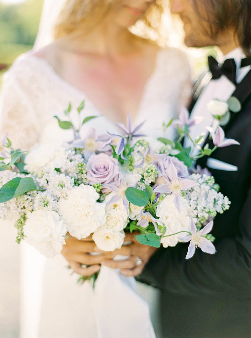 Romantic wedding bouquet with dusty purple and white flowers