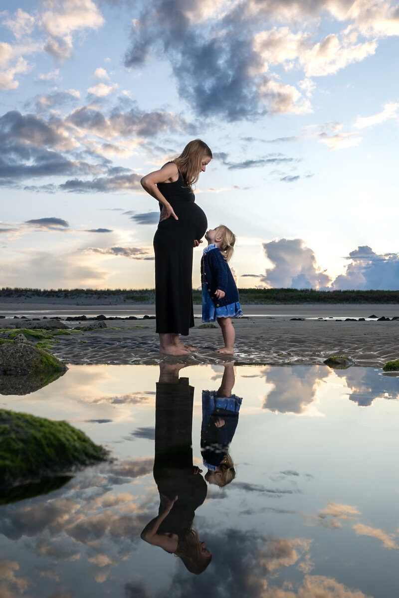 maternity portrait on beach with reflection