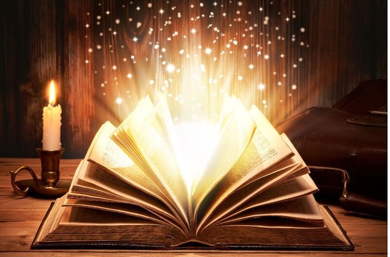 Magical sparkles coming out from an ancient book.