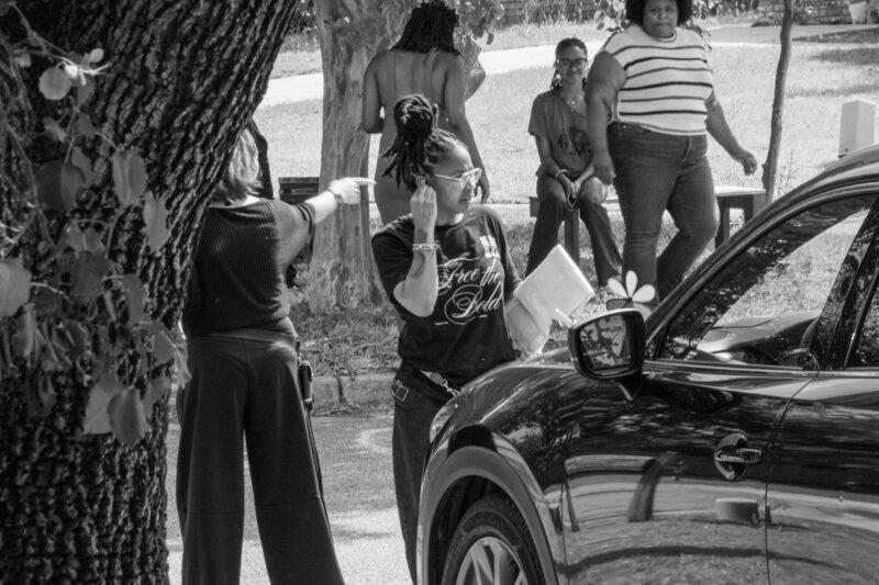 Personal trainers standing on road