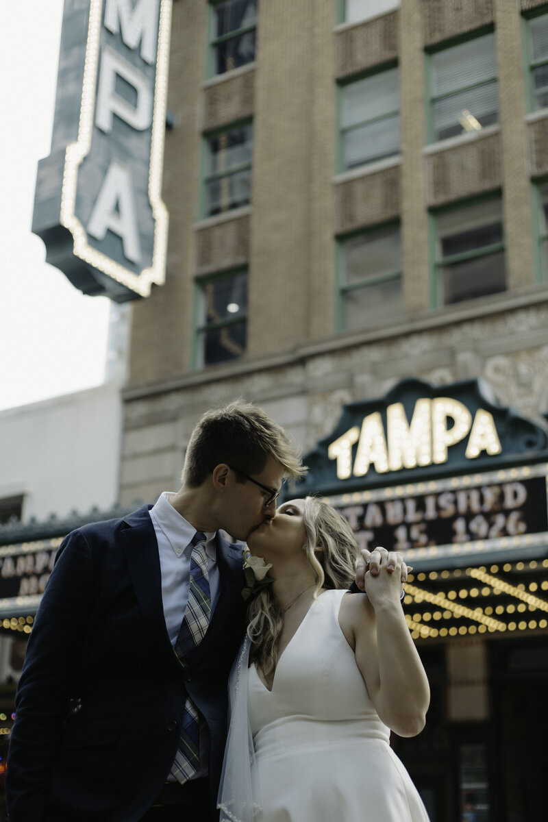 portraits of a couple in a vintage car after their tampa elopement