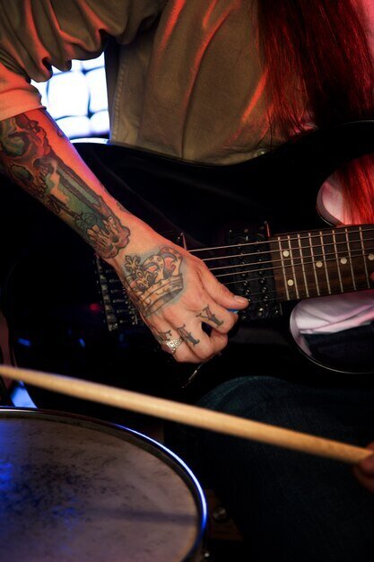 close-up-hand-playing-guitar_23-2149162973