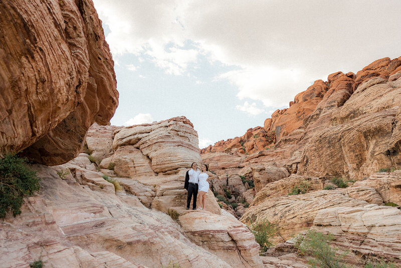 Couple who just got engaged posing at The Red Rock Canyon in Nevada