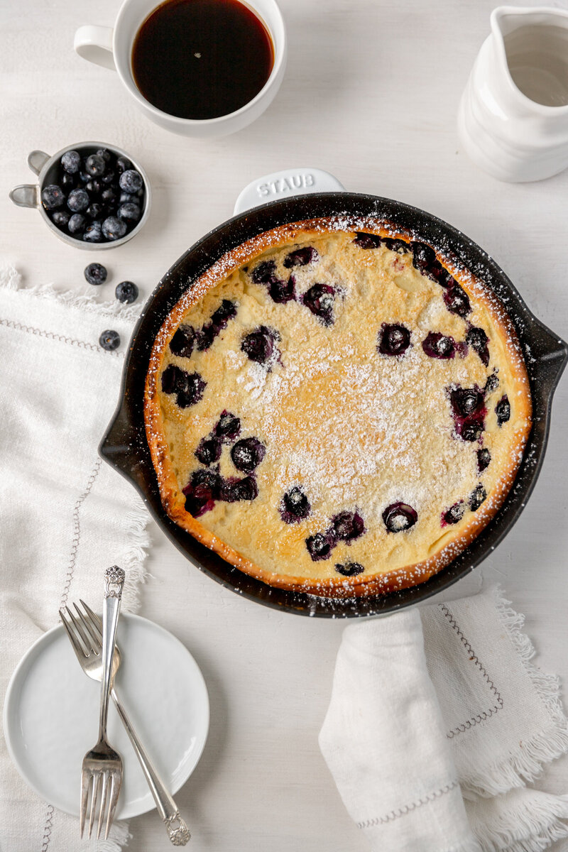 a blueberry dessert inside a dutch oven