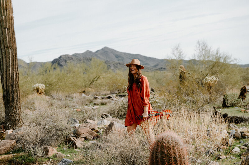 Julia Walking with her violin in the Arizona Desert