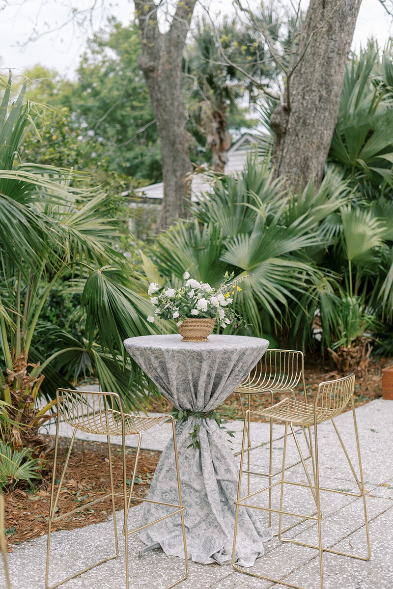 hightop cocktail table with linen and chairs