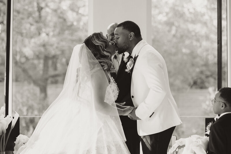 Swank Soiree Dallas Wedding Planner Jamie and Dwayne at The Bowden Wedding Venue - First Kiss as Husband and Wife