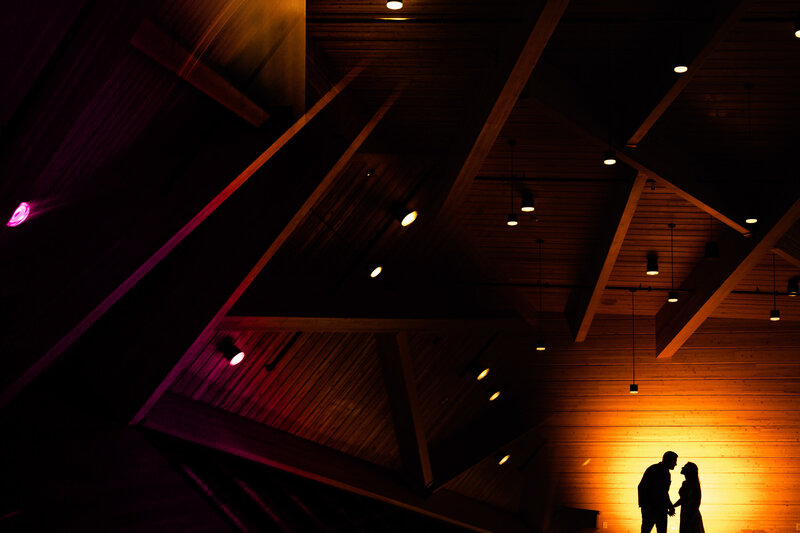 Wedding couple kissing in the Glass City Metro Park in Toledo Ohio