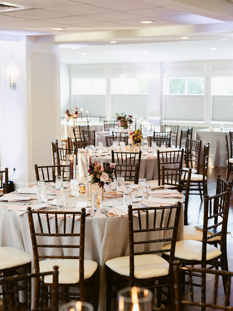 reception wedding tables with chairs around, taken by wedding photographers in baltimore Nicole Simensky