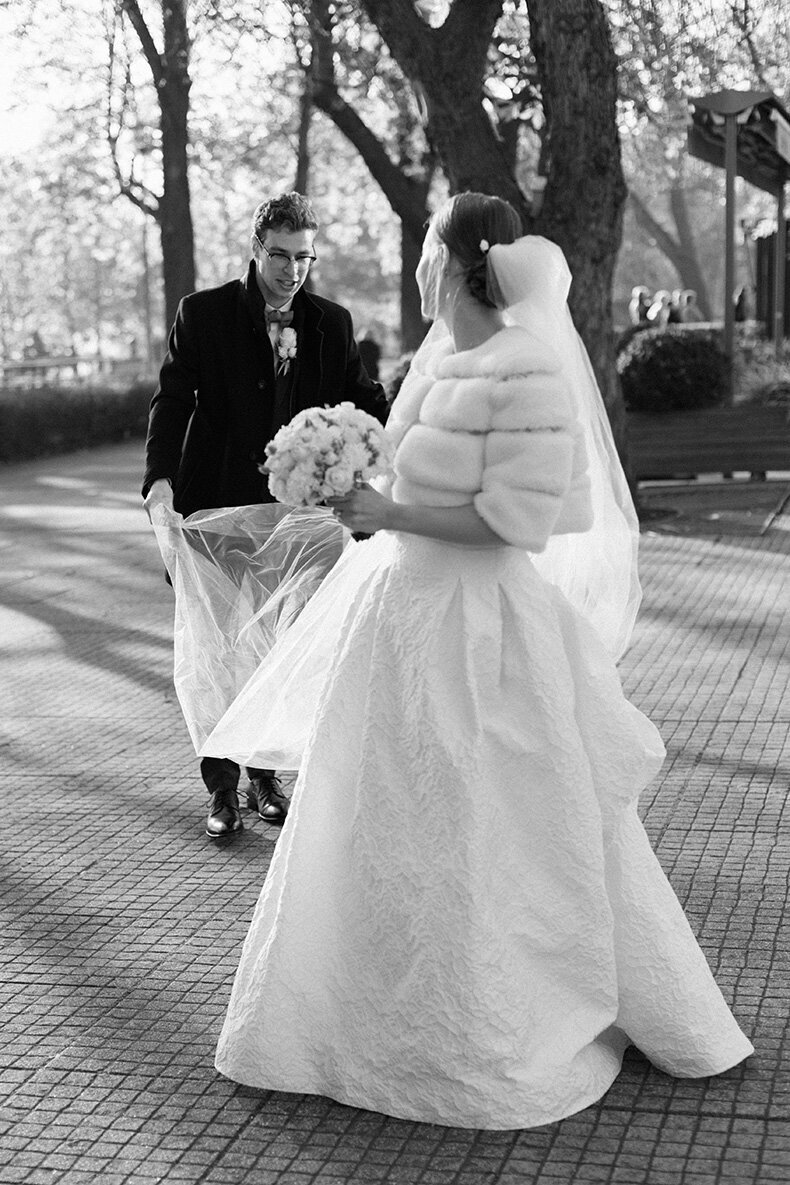 Luxury wedding in Europe – sophisticated bride in a modern wedding gown and groom in a timeless suit.