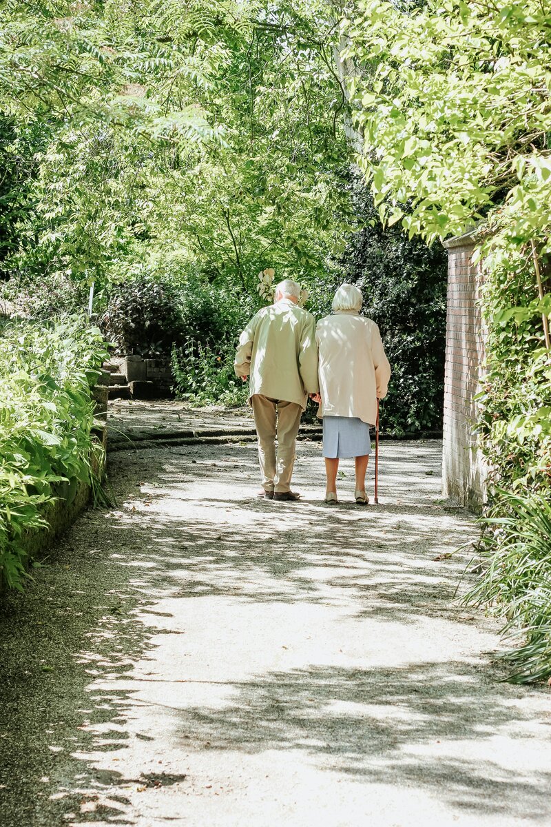 Elderly couple walking outdoors