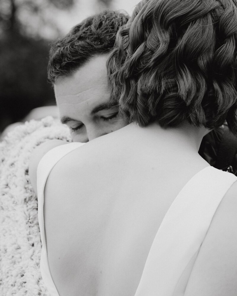 engaged couple hugging