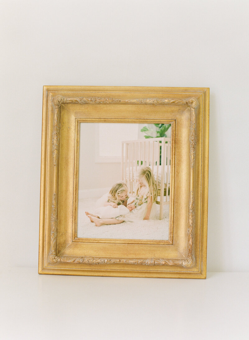 gold framed canvas Photographed by Raleigh newborn photographers A.J. Dunlap Photography.