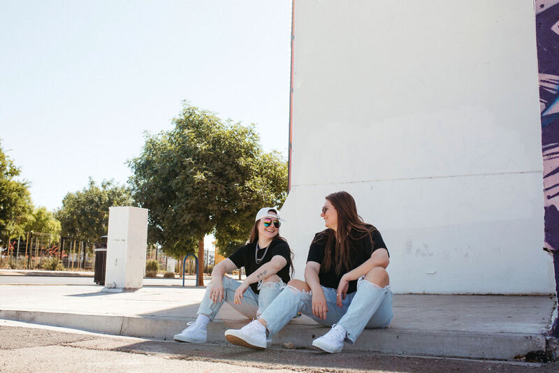 KP and Jessie sitting outdoors in Las Vegas.