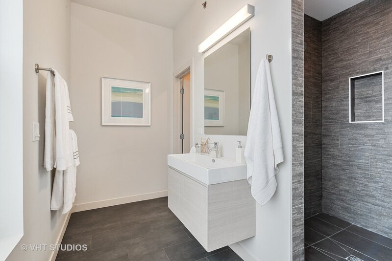 Ridgeway Master Bathroom with white towels grey slate shower room beige vanity