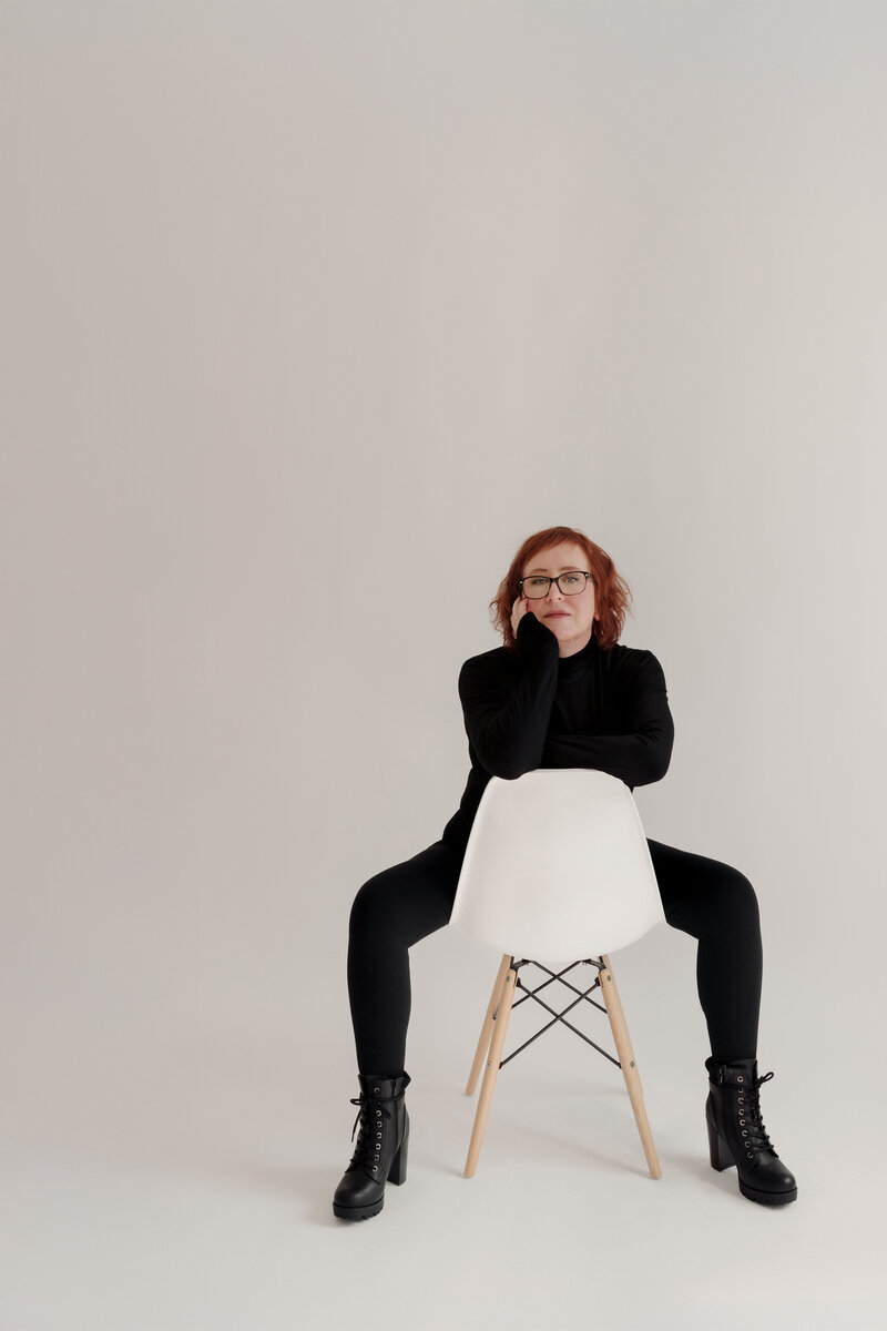 Editorial-style portrait of Forest Heart Photography's owner Carrie Schluckbier