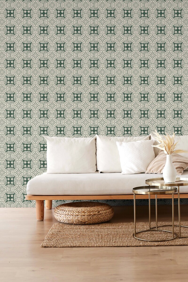 geometric Celtic inspired pattern featured in mossy green and cream on wallpaper in a boho  style room available for licensing