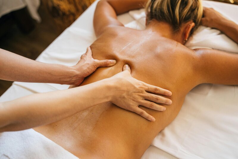 Women receiving a massage on her back