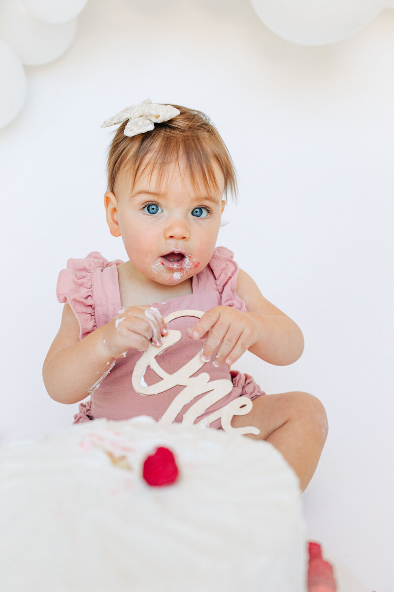 One year old cake smash with Asheville family photographer rachel marie photography