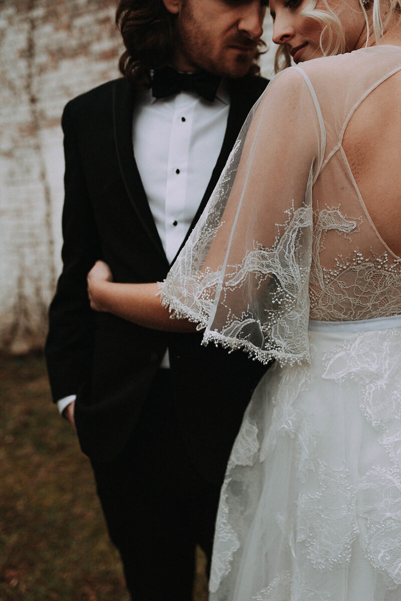 bride and groom in elegant wedding attire
