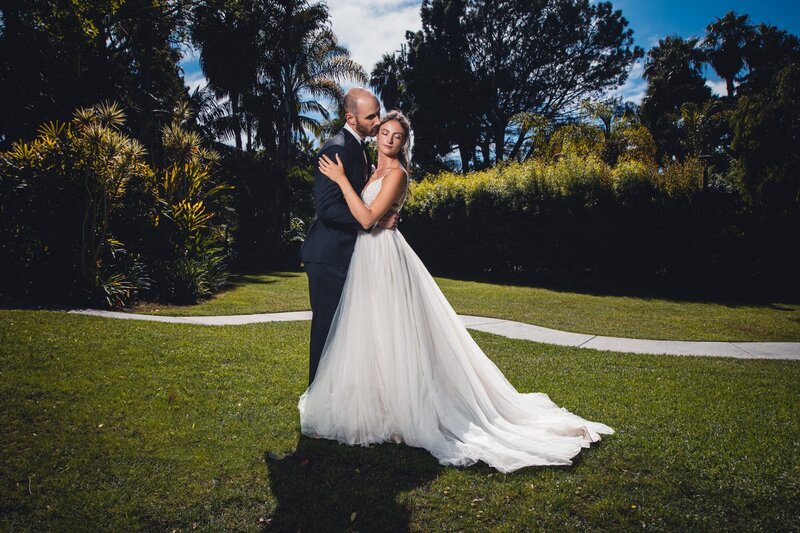 Bride and groom couple portraits in the grounds of Paradise Point Resort in San Diego