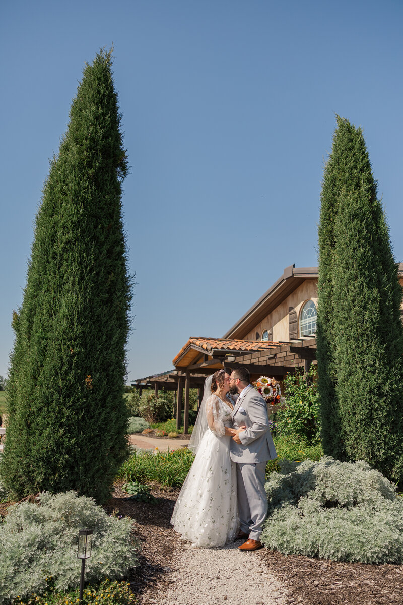 Wedding first look with bride and groom at Villa Aletta photographed in warm, true color photography style by Claire Katan Creative.